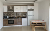 Spacious 1+1 apartment with furniture and household appliances 50 meters from the beach and promenade.-id-4501-photo-1