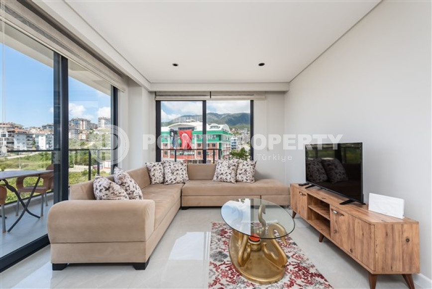 Modern functional apartment 50 m2 with a balcony, Oba district-id-4507-photo-1