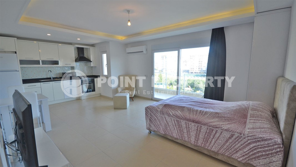 Недорогая студия с планировкой 1+0 и площадью 45 м2 в комплексе с инфраструктурой, Авсаллар-id-4510-фото-2