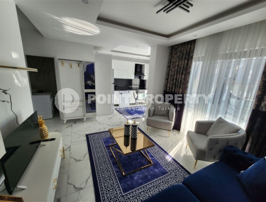 Новые двухуровневые апартаменты с дизайнерским ремонтом в центре Аланьи и в 900 метрах от моря.-id-4533-фото-2