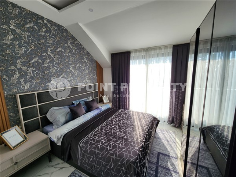 Новые двухуровневые апартаменты с дизайнерским ремонтом в центре Аланьи и в 900 метрах от моря.-id-4533-фото-6