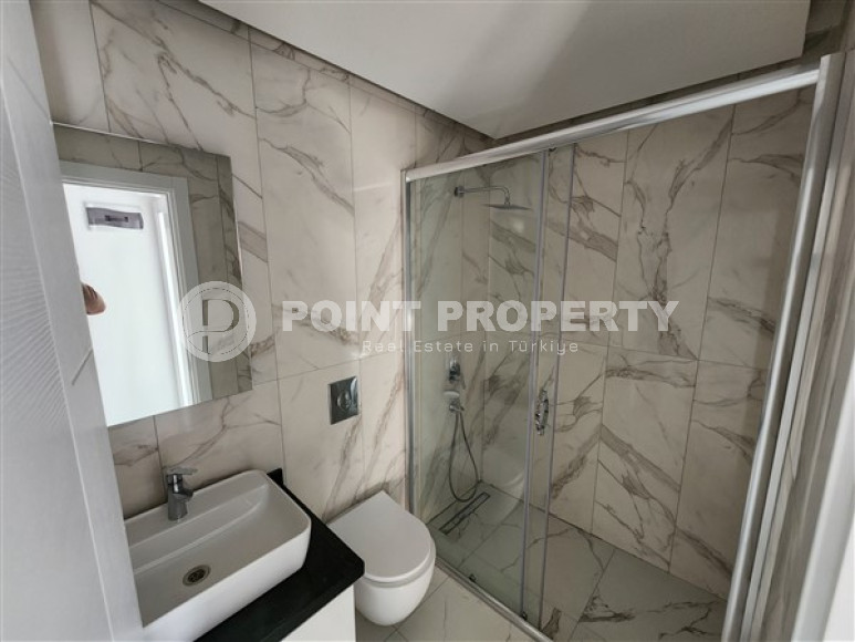 Новые двухуровневые апартаменты с дизайнерским ремонтом в центре Аланьи и в 900 метрах от моря.-id-4533-фото-7