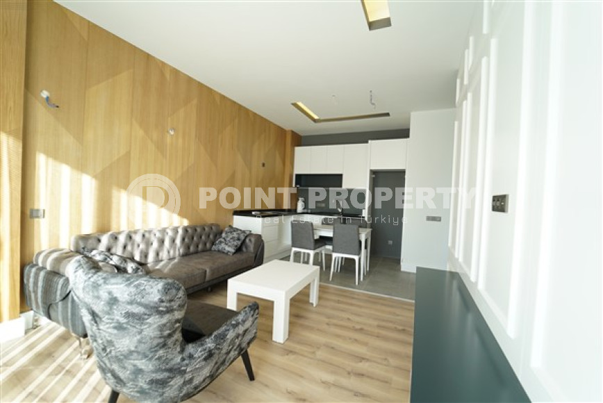 Современные двухкомнатные апартаменты 55 м2 с классическим интерьером комнат, центр Аланьи-id-4548-фото-2