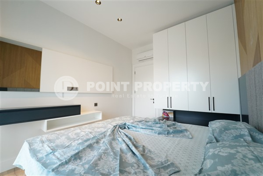 Современные двухкомнатные апартаменты 55 м2 с классическим интерьером комнат, центр Аланьи-id-4548-фото-5