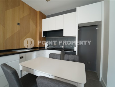 Современные двухкомнатные апартаменты 55 м2 с классическим интерьером комнат, центр Аланьи-id-4548-фото-3