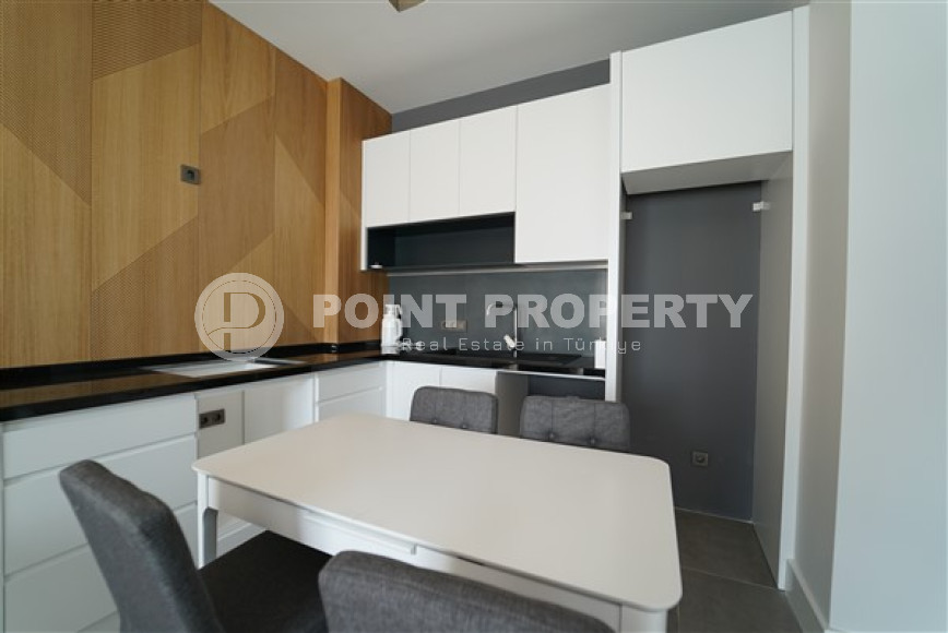 Современные двухкомнатные апартаменты 55 м2 с классическим интерьером комнат, центр Аланьи-id-4548-фото-3