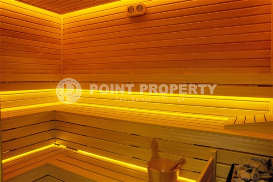 Современные двухкомнатные апартаменты 55 м2 с классическим интерьером комнат, центр Аланьи-id-4548-фото-13