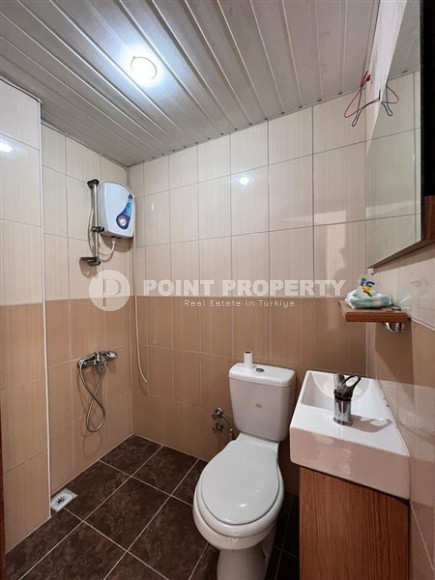 Бюджетная квартира, общей площадью 95 м2, в 800 метрах от моря в спокойном районе Аланьи - Авсаллар.-id-4556-фото-7