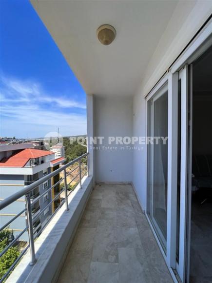 Бюджетная квартира, общей площадью 95 м2, в 800 метрах от моря в спокойном районе Аланьи - Авсаллар.-id-4556-фото-11