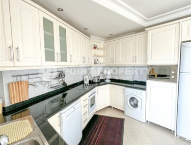 Просторная светлая квартира с тремя спальными комнатами на 7-м этаже в центре Аланьи.-id-4558-фото-4