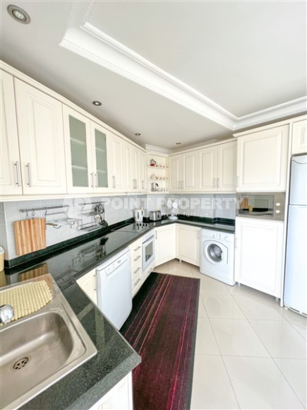 Просторная светлая квартира с тремя спальными комнатами на 7-м этаже в центре Аланьи.-id-4558-фото-4