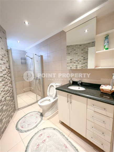 Просторная светлая квартира с тремя спальными комнатами на 7-м этаже в центре Аланьи.-id-4558-фото-11