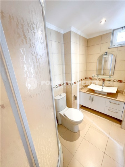 Просторная светлая квартира с тремя спальными комнатами на 7-м этаже в центре Аланьи.-id-4558-фото-12