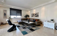 Stylish modern apartment on the 7th floor with panoramic views of the city and mountains.-id-4560-photo-1