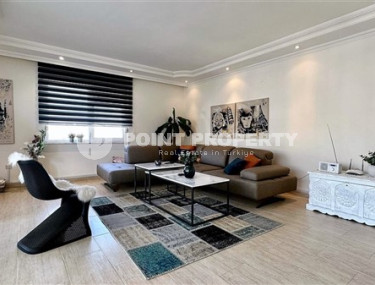 Stylish modern apartment on the 7th floor with panoramic views of the city and mountains.-id-4560-photo-1
