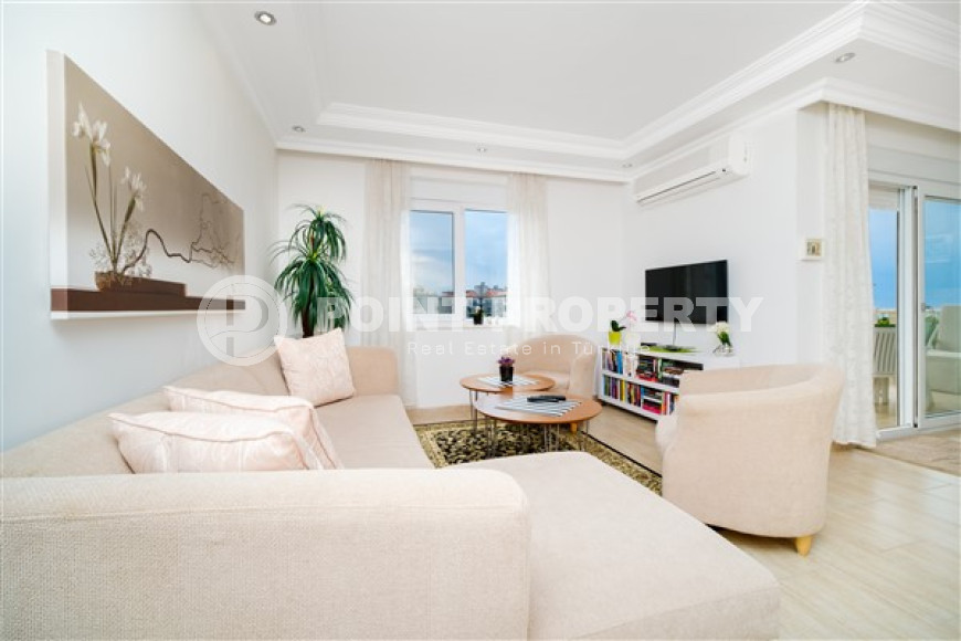 Апартаменты 2+1 с приятным светлым интерьером на 3-м этаже в центре района Оба.-id-4561-фото-2