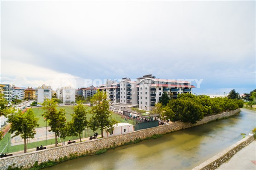 Апартаменты 2+1 с приятным светлым интерьером на 3-м этаже в центре района Оба.-id-4561-фото-12