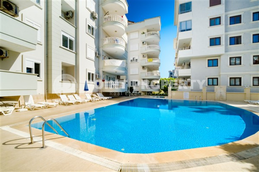 Апартаменты 2+1 с приятным светлым интерьером на 3-м этаже в центре района Оба.-id-4561-фото-14