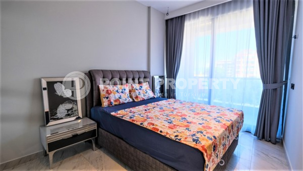 Компактная квартира с современным дизайном в 50 метрах от моря в спокойном районе Аланьи - Каргыджак.-id-4562-фото-4