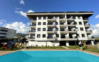 Three-room apartment with an area of 110 m2 and two balconies in a complex built in 2022, Oba district-id-4565-photo-1