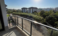Three-room apartment with an area of 110 m2 and two balconies in a complex built in 2022, Oba district-id-4565-photo-8