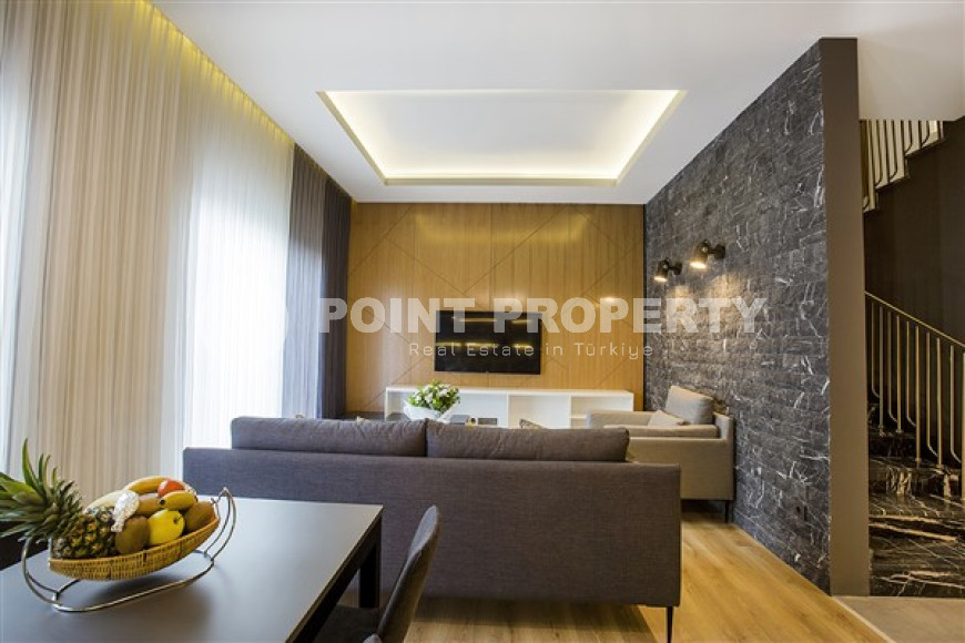 Stylish two-level apartment on the 1st and 2nd floors 350 meters from the sea in the center of Alanya.-id-4576-photo-2