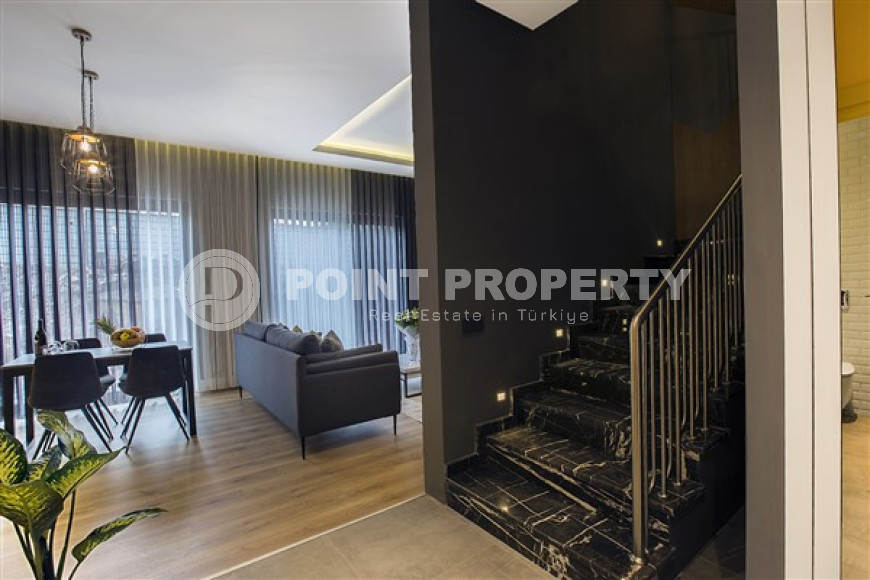Stylish two-level apartment on the 1st and 2nd floors 350 meters from the sea in the center of Alanya.-id-4576-photo-4