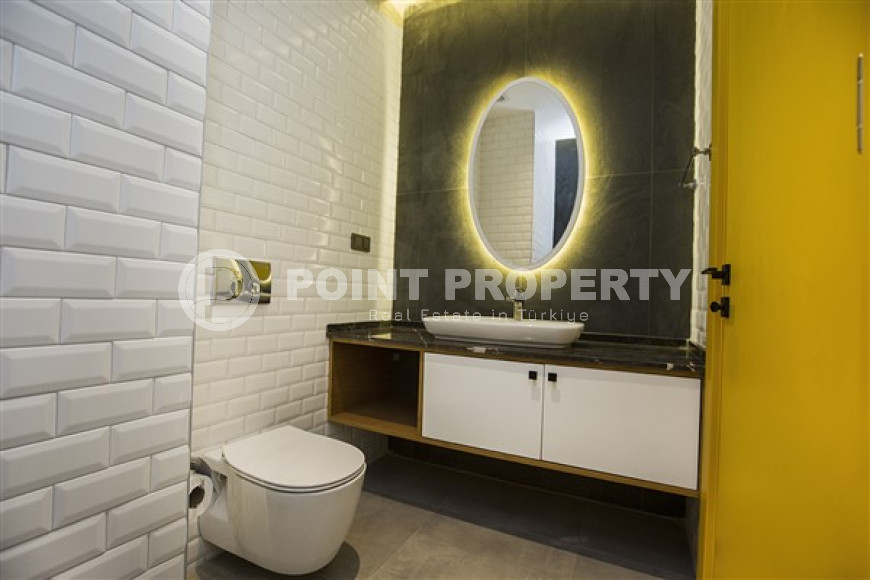 Stylish two-level apartment on the 1st and 2nd floors 350 meters from the sea in the center of Alanya.-id-4576-photo-9