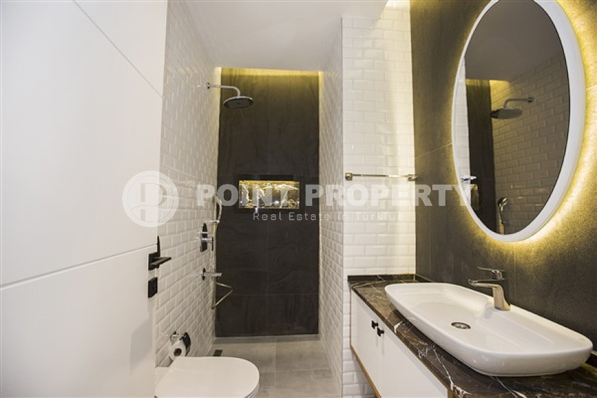 Stylish two-level apartment on the 1st and 2nd floors 350 meters from the sea in the center of Alanya.-id-4576-photo-10