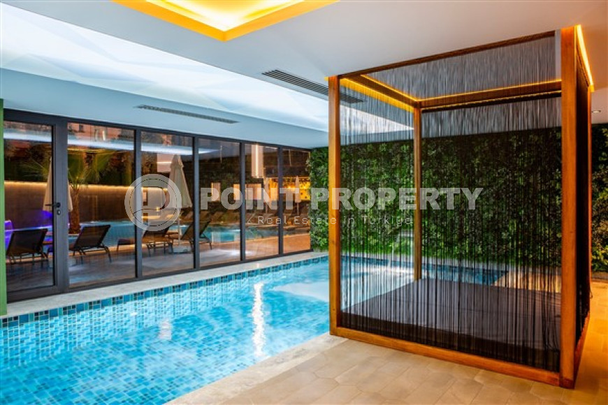 Stylish two-level apartment on the 1st and 2nd floors 350 meters from the sea in the center of Alanya.-id-4576-photo-11