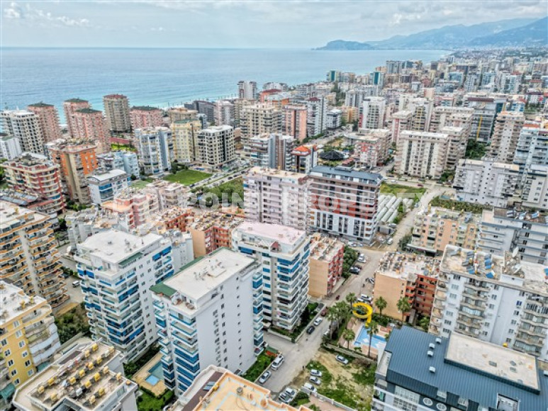 Luxurious three-room apartment 125 m2 with two balconies, Mahmutlar district-id-4588-photo-14