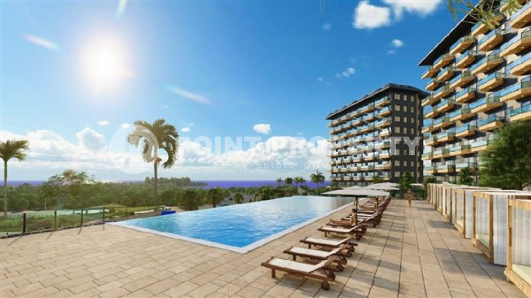 Бюджетные апартаменты с площадью 48 м2 в строящемся комплексе, район Авсаллар-id-4589-фото-8