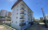 Two-room apartment with an area of 58 m2 in a complex built in 2021, Mahmutlar-id-4591-photo-1
