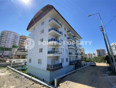Two-room apartment with an area of 58 m2 in a complex built in 2021, Mahmutlar-id-4591-photo-1