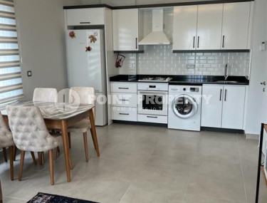 Two-room apartment with an area of 58 m2 in a complex built in 2021, Mahmutlar-id-4591-photo-2