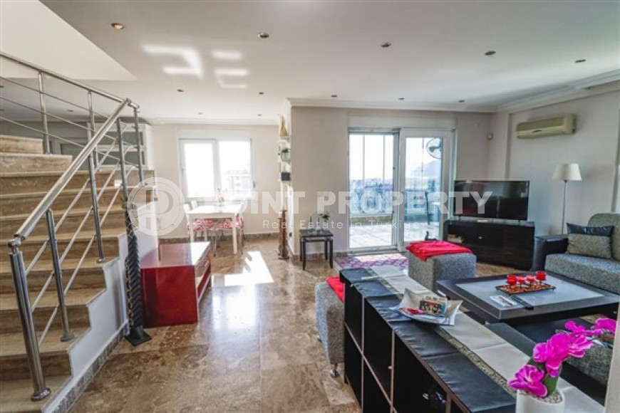 Spacious two-level 3+1 apartment on the 5th floor with an attic in a quiet, comfortable area of Alanya - Cikcilli.-id-4594-photo-3