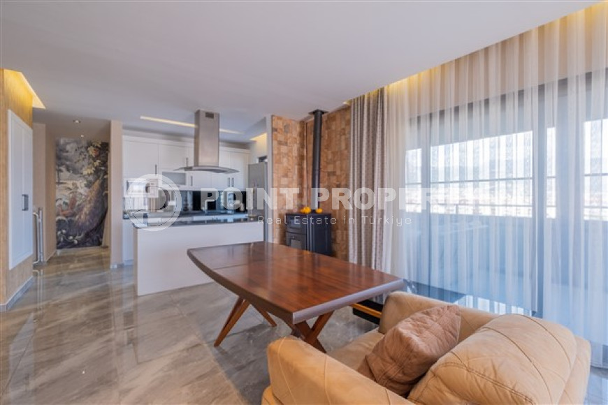 Панорамный дуплекс на 5-м этаже с мансардой в 300 метрах от пляжа и набережной в районе Оба.-id-4598-фото-2