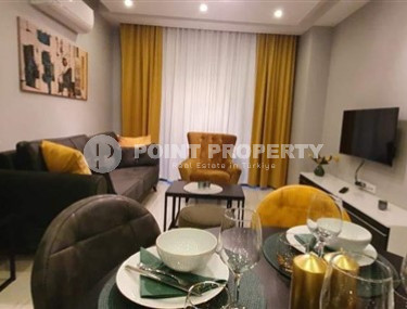 Compact apartment with modern design within walking distance to the beach and center of Alanya.-id-4599-photo-1