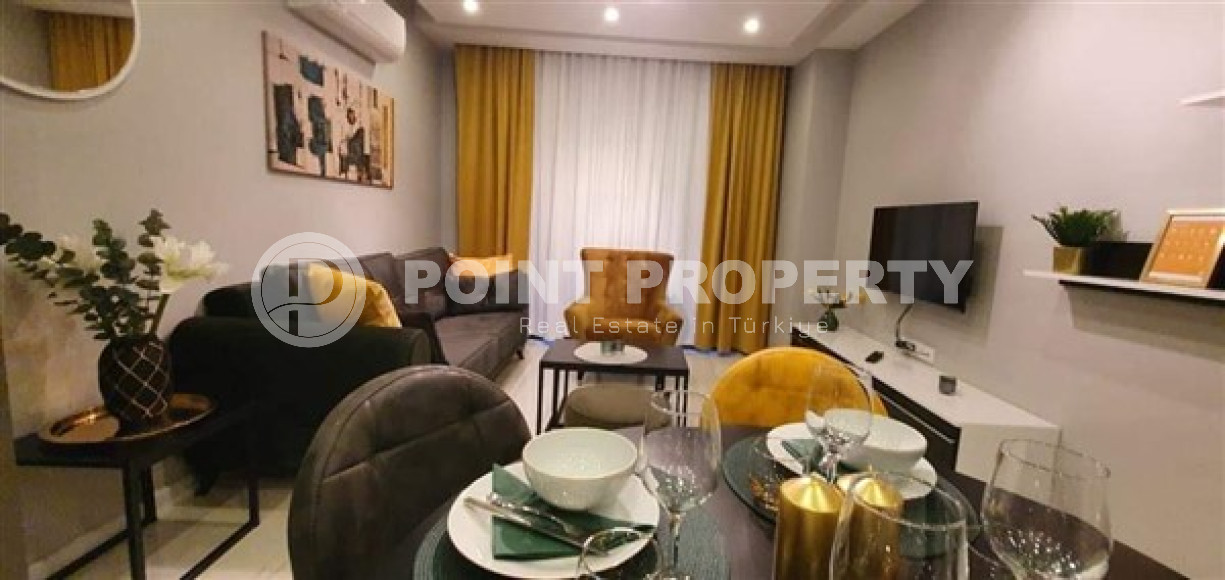 Compact apartment with modern design within walking distance to the beach and center of Alanya.-id-4599-photo-1