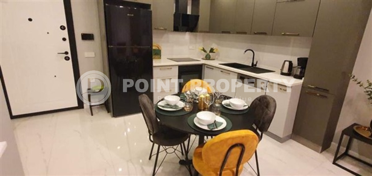 Компактная квартира с современным дизайном в нескольких минутах ходьбы от пляжа и центра Аланьи.-id-4599-фото-3