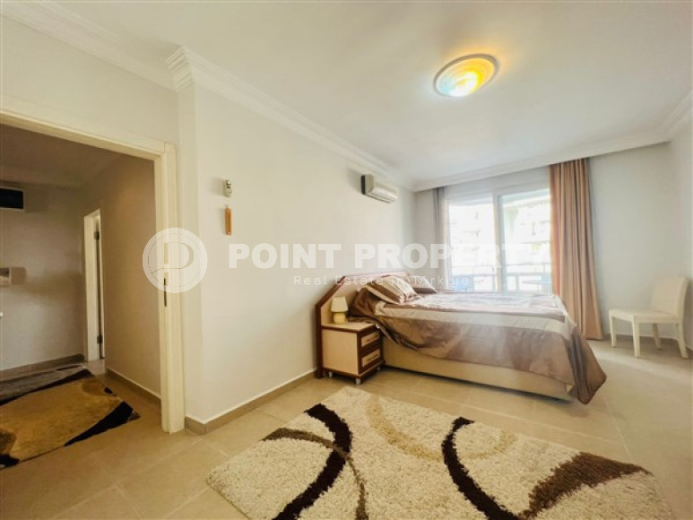 Spacious, bright apartment with two bedrooms 800 meters from the sea in a calm, landscaped area of Alanya - Cikcilli.-id-4602-photo-5