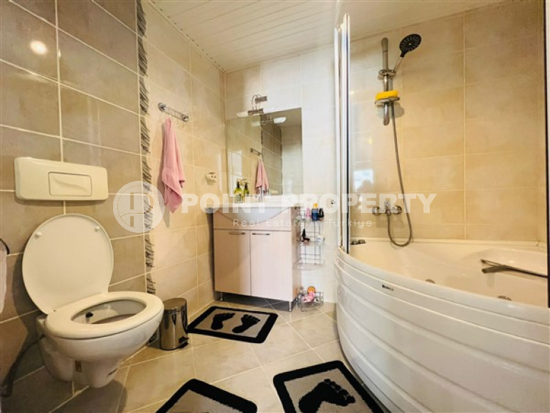 Spacious, bright apartment with two bedrooms 800 meters from the sea in a calm, landscaped area of Alanya - Cikcilli.-id-4602-photo-6