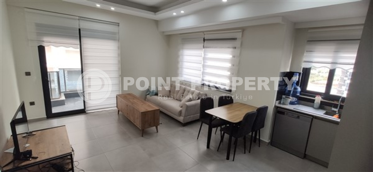 Small three-room penthouse 145 m2 in a residence built in 2021, Mahmutlar district-id-4605-photo-2