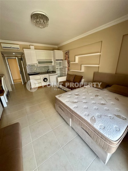 Inexpensive one-room studio 40 m2 with a balcony, Mahmutlar district-id-4609-photo-2