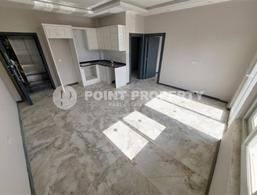 Новая квартира 1+1 с площадью 60 м2 в недавно построенной резиденции, район Авсаллар-id-4610-фото-2