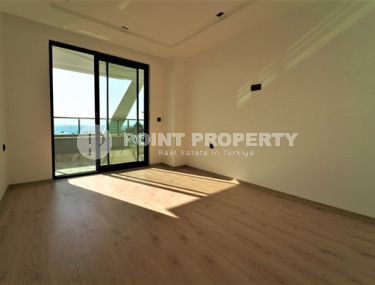 Новая квартира на 3-м этаже с видом на море в престижном районе Каргыджак.-id-4615-фото-2