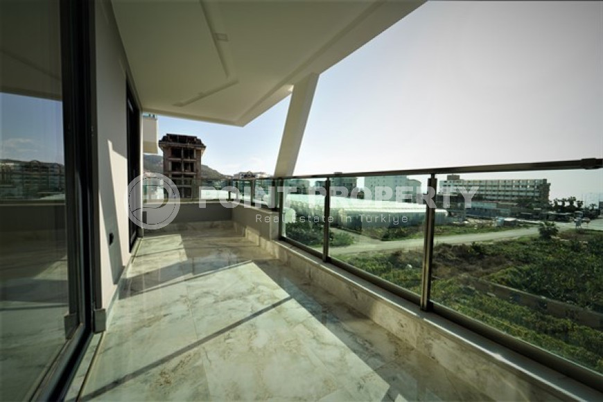 Новая квартира на 3-м этаже с видом на море в престижном районе Каргыджак.-id-4615-фото-8