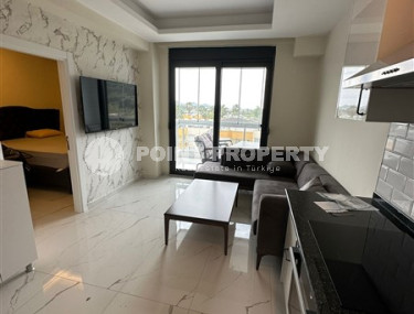 Светлая меблированная квартира 1+1 на 5-м этаже в новом доме, введенном в эксплуатацию в 2022 году.-id-4616-фото-2