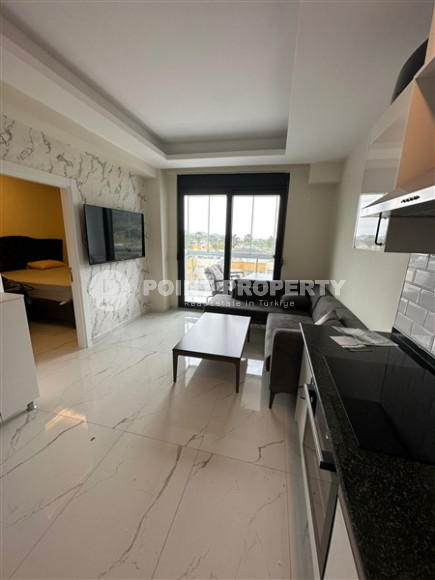 Светлая меблированная квартира 1+1 на 5-м этаже в новом доме, введенном в эксплуатацию в 2022 году.-id-4616-фото-2