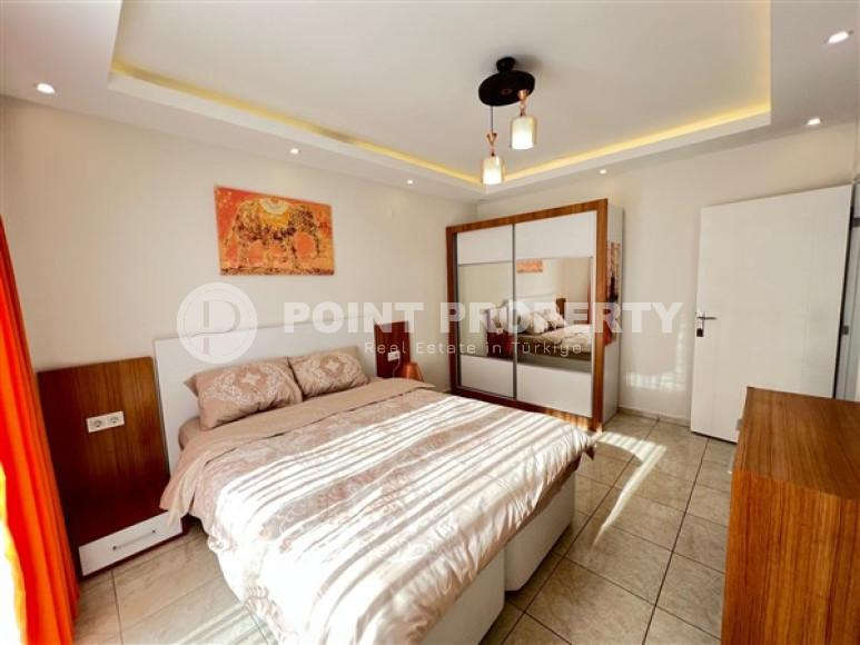Spacious 1+1 apartments with modern design 150 meters from the sea in the center of Alanya's popular Mahmutlar area.-id-4622-photo-4